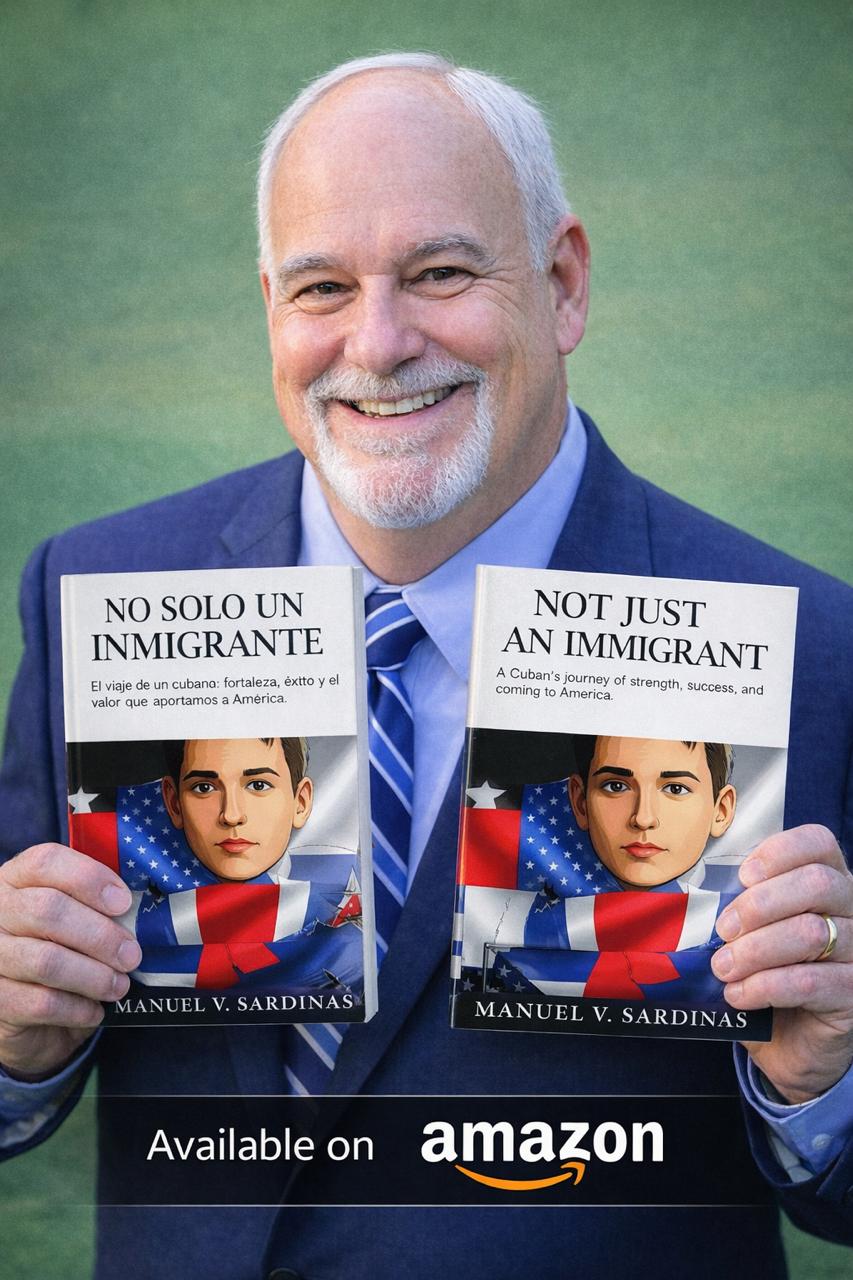 Manuel V. Sardinas holding English and Spanish editions of his memoir